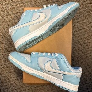 Nike Dunk Low Retro Fleece Swoosh Worn Blue Sneakers in Light Blue and White